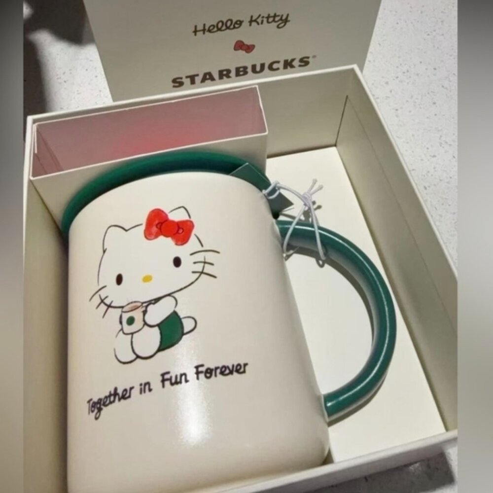 Starbucks Hello Kitty Mug with Teal Handle